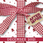a red and white holiday gift box with a big bow