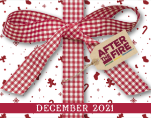a red and white holiday gift box with a big bow