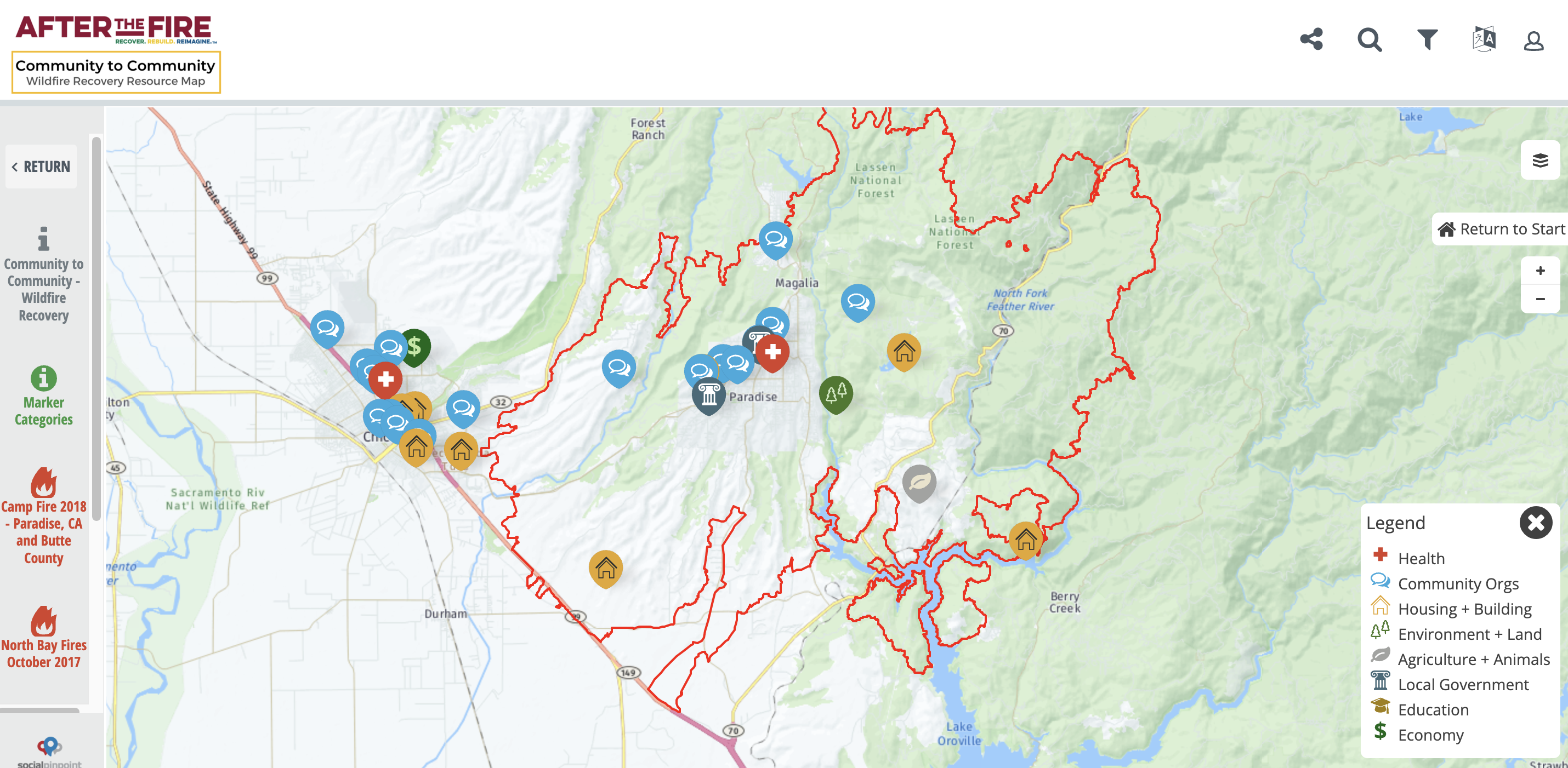 Screenshot of the Community to Community Wildfire Recovery Resources Map with a base map of the Camp Fire area in Butte County CA with a red perimeter of the Camp Fire delineated and info marker pins positioned around the area