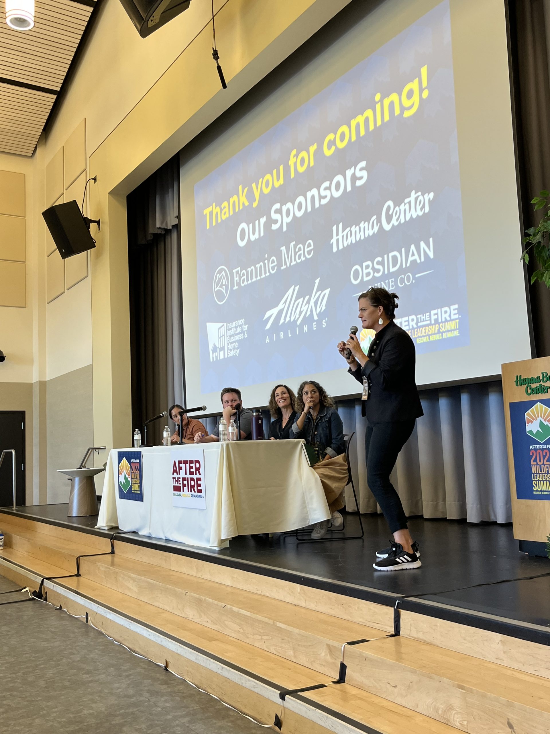 Following the panel on philanthropy, Jennifer Gray Thompson takes a moment to pay special thanks to the sponsors of the Wildfire Leadership Summit: Fannie Mae, Alaska Airlines, Hanna Center, IBHS, and Obsidian Wine Company