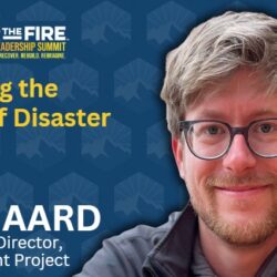 Will Heegaard smiles, promoting Greening the Space of Disaster at the 2023 Wildfire Leadership Summit, where wildfire leadership summit attendees unite for resilience and innovation.