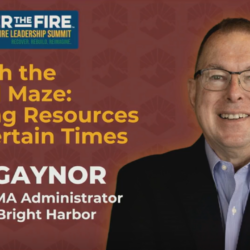 Smiling man in suit and glasses with summit details and presentation title about securing federal resources.