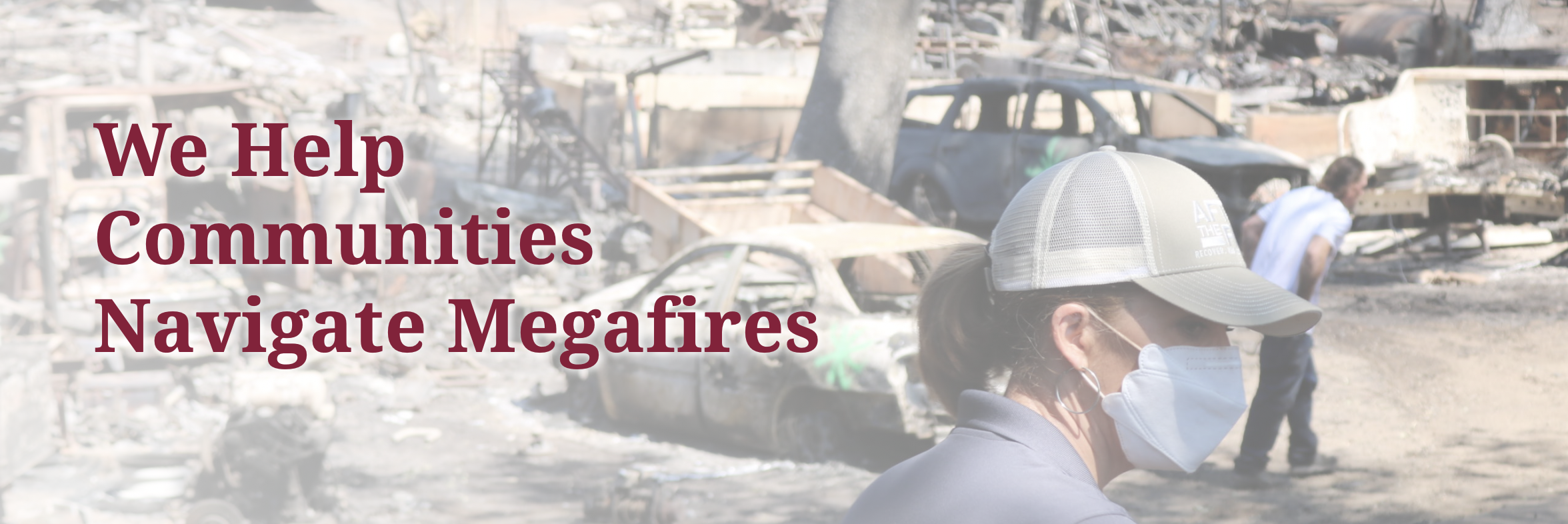 Person in mask surveys wildfire damage; text reads “After the Fire USA Helps Communities Navigate Megafires and Support Community Recovery.” Burned cars and debris visible.